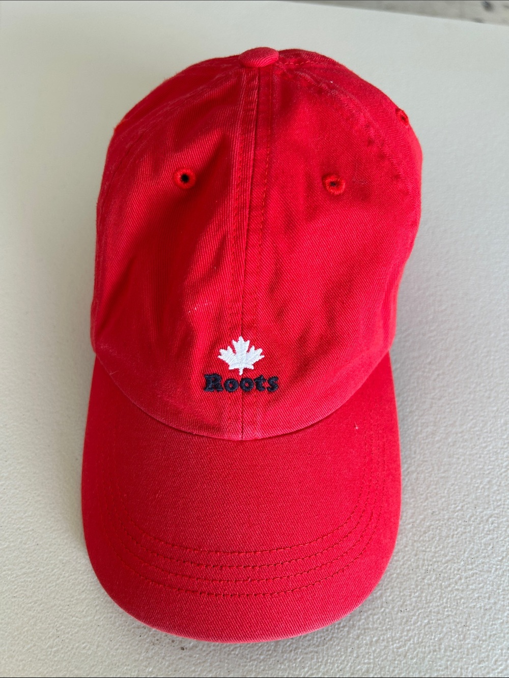 Roots Red Cap with White Maple Emblem